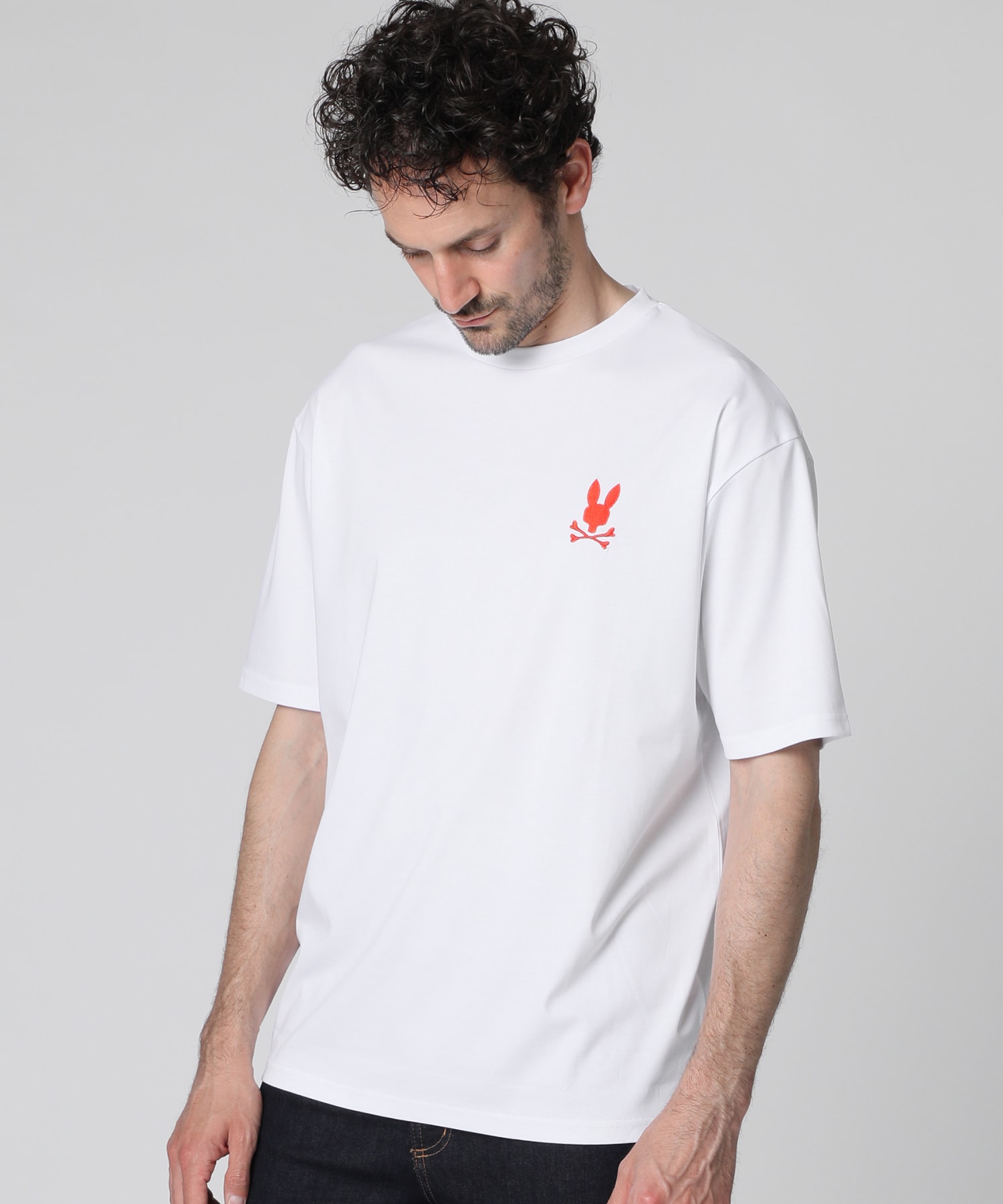 バックフォントロゴ シルケットスムース Tシャツ｜Psycho Bunny