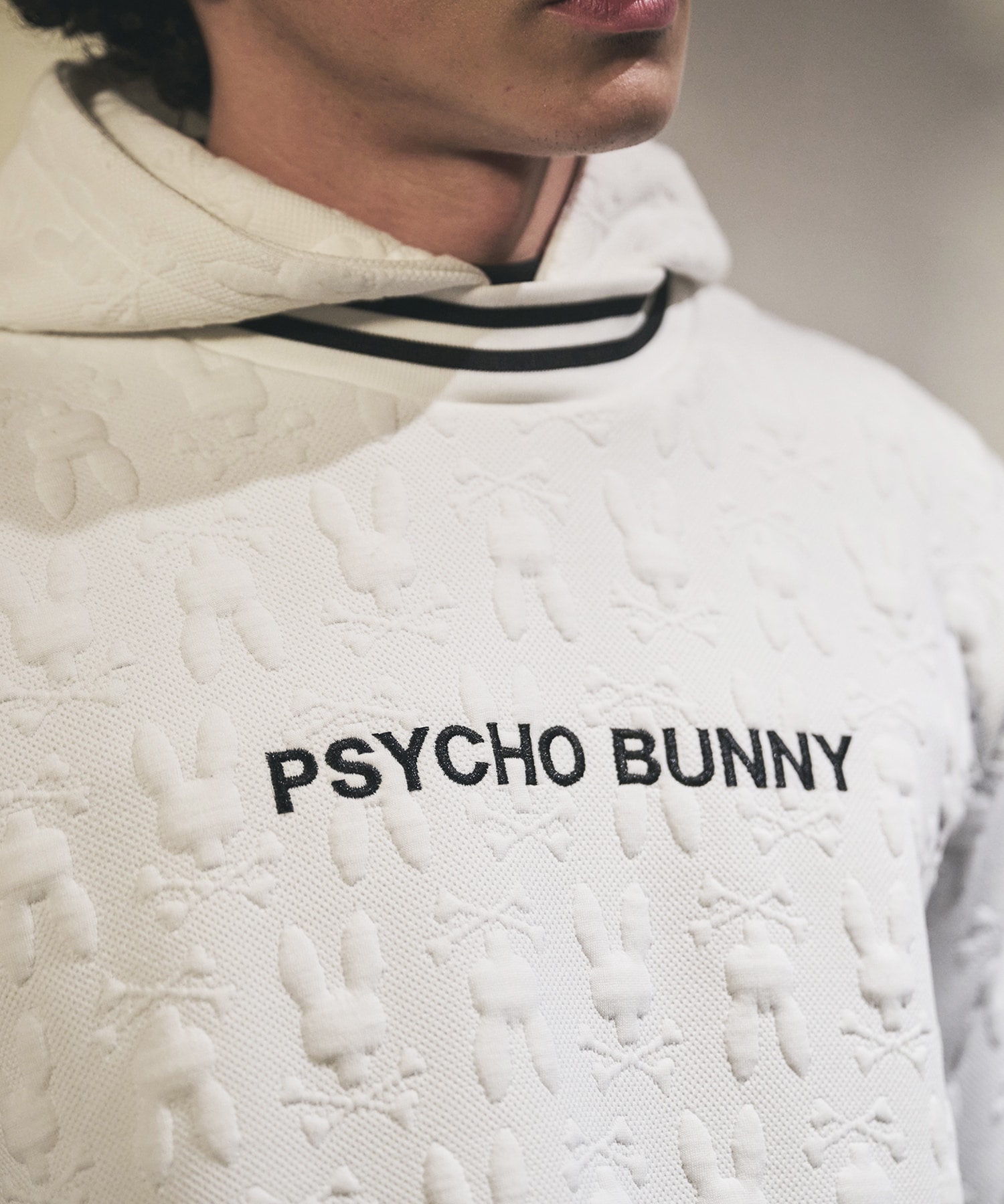 GOLF]膨れジャガードバニーロゴスウェットパーカ｜Psycho Bunny