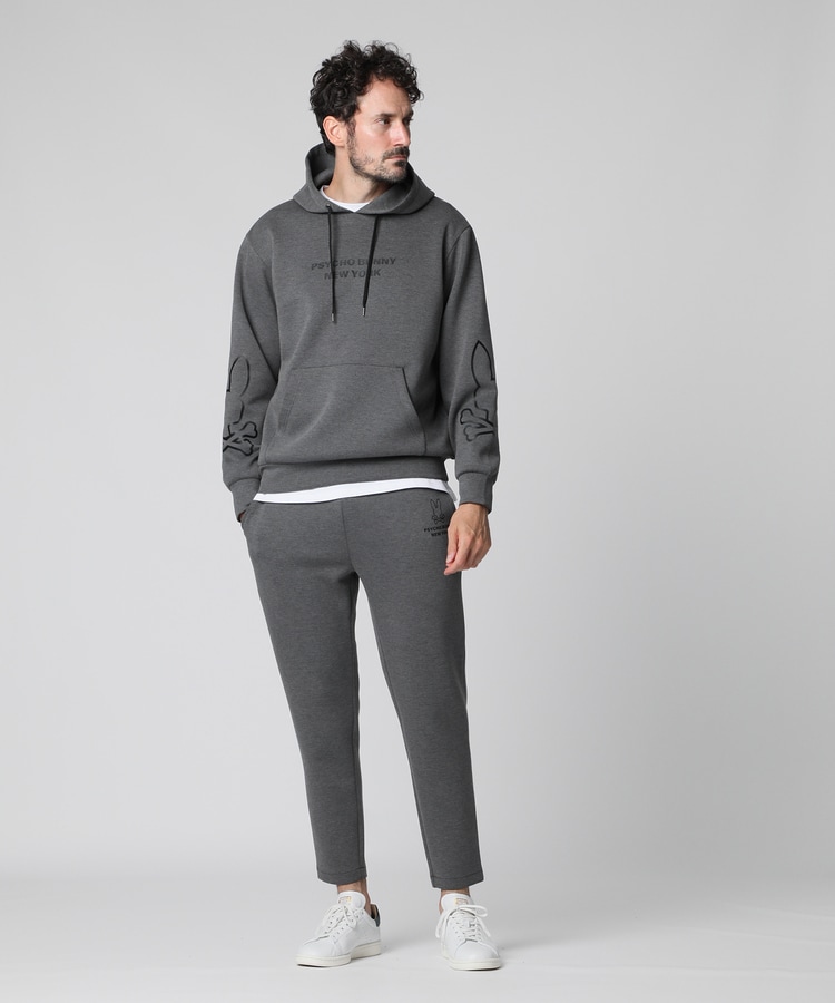 WEB限定]スリーブアウトラインロゴ ダンボール パーカ｜Psycho Bunny